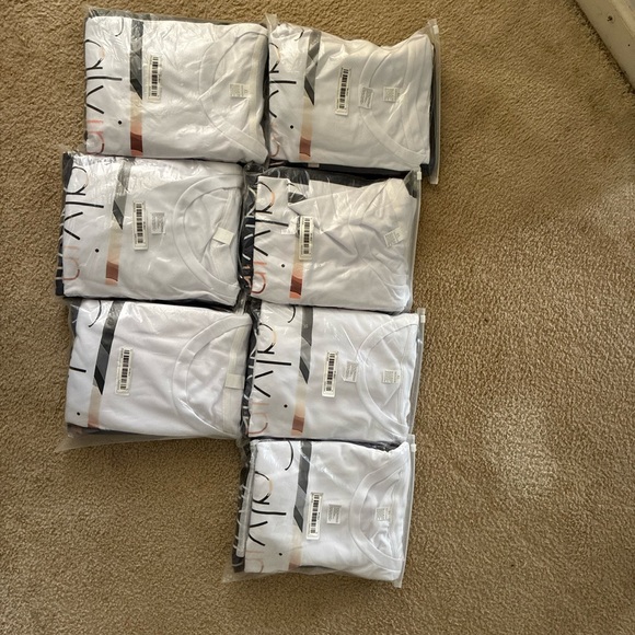 Bundle of 21 (Calvin) t-shirts for sale $890 white blue navy and grey